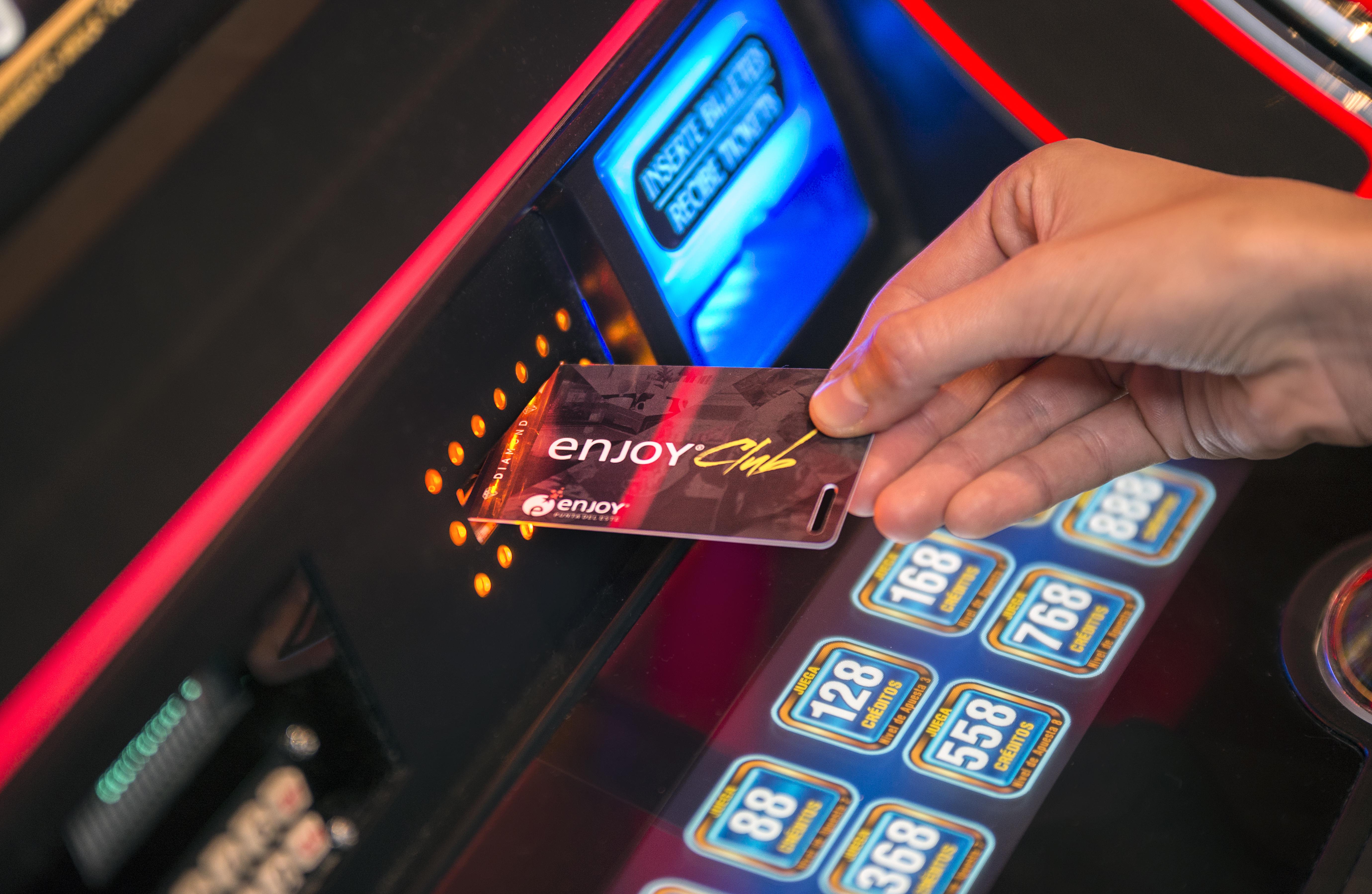 Enjoy Punta Del Este Eksteriør billede A card being inserted into a slot machine
